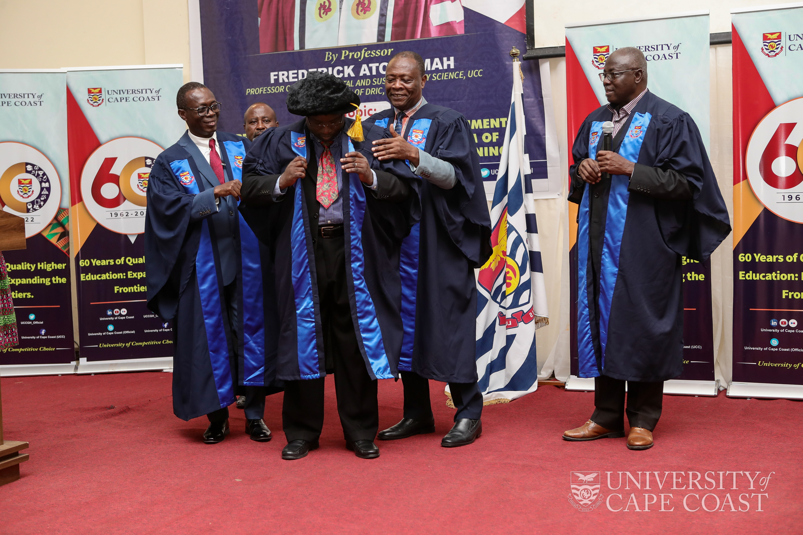 Prof. Armah being admitted into the College of Professors
